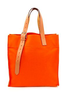 An HermËs Orange Canvas Etiviere Shopping Tote, 16" x 17" x 6"; Strap adjustable to 17".