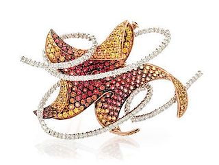 An 18 Karat Gold, Diamond and Multi Color Sapphire Leaf Brooch, 12.90 dwts.