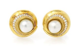 A Pair of 18 Karat Yellow Gold, Cultured Pearl and Diamond Earclips, de Vroomen, 30.20 dwts.