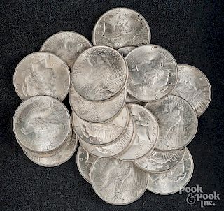 Nineteen Peace silver dollars