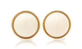 A Pair of 14 Karat Yellow Gold and White Coral Earclips, 13.40 dwts.