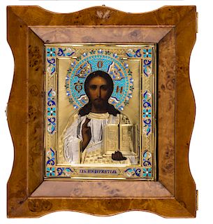 A RUSSIAN ICON OF CHRIST PANTOCRATOR WITH SILVER GILT AND ENAMEL OKLAD, MOSCOW, 1908-1917