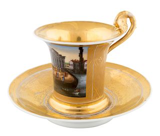A GILTED PORCELAIN CUP AND SAUCERS WITH A VIEW OF ST.PETERSBURG, BATENIN FACTORY, ST.PETERSBURG, 1818-1832
