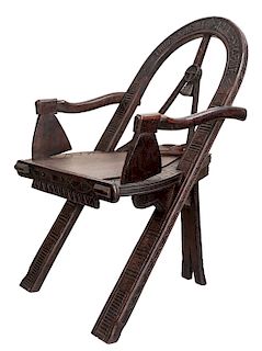 A RUSSIAN CARVED OAK CHAIR AFTER THE DESIGN BY VASILI PETROVICH SHUTOV (RUSSIAN 1826-1887), LATE 19TH CENTURY