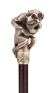 A FABERGE SILVER CANE HANDLE OF LESHIY, WORKMASTER JULIUS RAPPOPORT, ST. PETERSBURG, 1899-1908