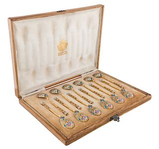 A SET OF TWELVE RUSSIAN SILVER GILT AND CLOISONNE ENAMEL COFFEE SPOONS, 11TH ARTEL, MOSCOW, 1908-1917