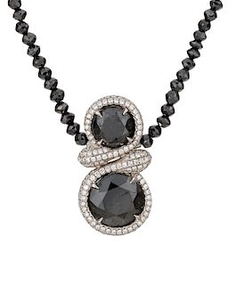 A FRENCH PLATINUM, BLACK ONYX AND DIAMONDS NECKLACE, PROBABLY BOUCHERON, EARLY 20TH CENTURY