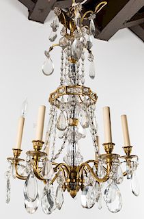 A LOUIS XV STYLE CUT GLASS AND GILT METAL SIX-LIGHT CHANDELIER