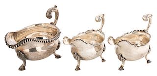 A GEORGE III AND GEORGE IV STERLING SILVER SET OF THREE SAUCERS, WORKMASTERS WILLIAM SKEEN, 1769 AND REBECCA EMES AND EDWARD BARNARD I,1828, LONDON