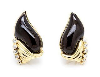 A Pair of 18 Karat Yellow Gold, Onyx and Diamond Earclips, 13.20 dwts.
