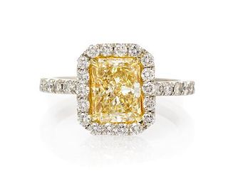 A Platinum, 18 Karat Yellow Gold, Fancy Color Diamond and Diamond Ring, 4.70 dwts.
