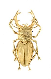 An 18 Karat Yellow Gold and Sapphire Beetle Brooch, Angela Cummings, Circa 1989, 18.70 dwts.