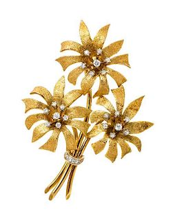 An 18 Karat Yellow Gold and Diamond Flower Brooch, 17.10 dwts.