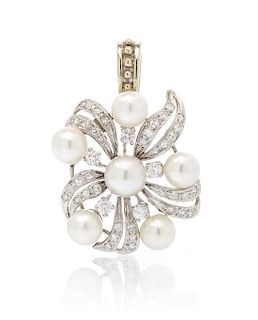 * A 14 Karat White Gold, Cultured Pearl and Diamond Pendant, 5.50 dwts.