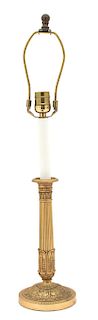 A French Empire Style Gilt Bronze Candlestick-Form Lamp Height 23 1/2 inches.