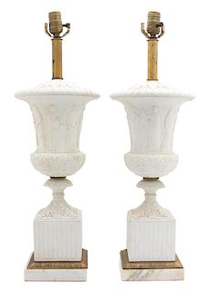 A Pair of French Empire Gilt Metal Mounted Parianware Campana Urns Height 23 1/2 inches.
