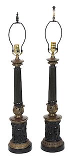 A Pair of Neoclassical Style Ebonized and Gilt Bronze Columnar Table Lamps Height 36 3/4 inches.
