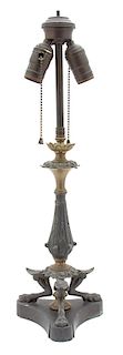 A Neoclassical Style Patinated Metal Two-Light Table Lamp Height 20 inches.