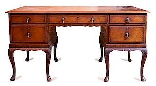 A George II Style Inlaid Mahogany Desk Height 30 x width 58 x depth 32 inches.