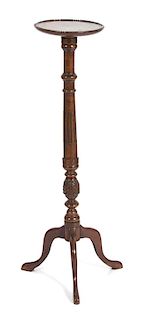 A George III Style Mahogany Tripod Pedestal Height 43 x diameter 11 inches.