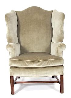 A George III Style Mahogany Wing Chair Height 44 inches.