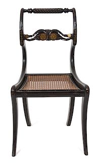 A Regency Ebonized and Brass Inlaid Cane Seat Side Chair Height 32 1/4 inches.
