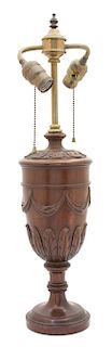 A Regency Style Carved Mahogany Urn-Form Two-Light Table Lamp Height 23 inches.