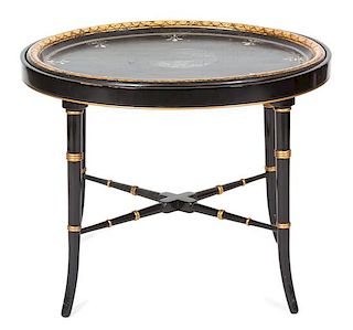 A Regency Ebonized and Gilt Lacquered Mother-of-Pearl Inset Tray Top Table Height 19 3/4 x width 24 x depth 19 1/2 inches.