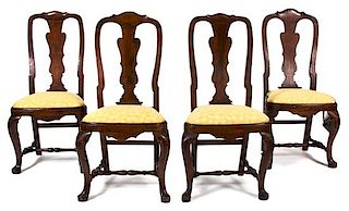 A Set of Four Queen Anne Walnut Side Chairs Height 43 inches.