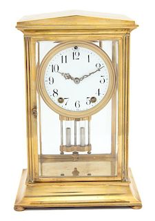 A Seth Thomas Empire Style Brass Mantle Clock Height 11 1/4 inches.