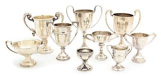 A Collection of Nine English Silver Trophy Cups, Birmingham, Various Makers and Dates, all inscribed, one with crossed polo mall