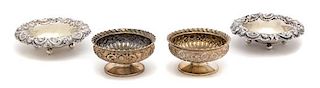 Two Pairs of American Silver Footed Salts, J. E. Caldwell, Philadelphia, PA, one pair with gadrooned rim, the other with chased