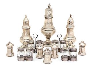 A Collection of Eight American Silver Salts and Peppers, Various Makers, together with four pairs of .800 silver and glass salt