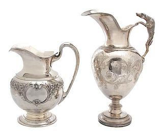 Two Sheffield Silver Plate Ewers Height of tallest 15 3/4 inches.