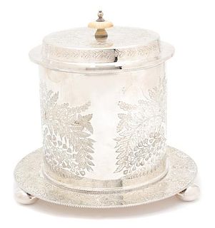 A Sheffield Silver Plate Biscuit Box, 19TH CENTURY, having engraved foliate decoration, with hinged lid.