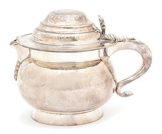 A Irish Silver Plate Hand Hammered Pitcher, 19TH CENTURY, the lid inset with an Irish coin, with an engraved armorial on the bod
