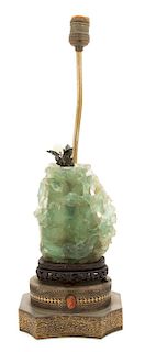 A Chinese Floral Carved Green Quartz Vase Height of quartz 6 inches.