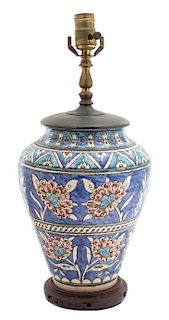 A Persian Glazed Ceramic Vase Vase, height 11 inches.