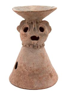 A Pre-Columbian Style Ceramic Effigy-Head Brazier Height 16 1/4 inches.