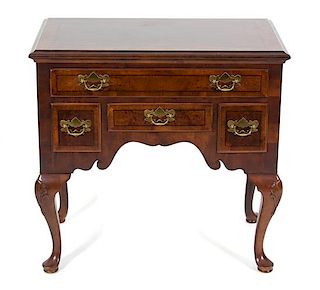 A Queen Anne Style Inlaid Mahogany Lowboy Height 28 1/2 x width 29 1/2 x depth 17 1/2 inches.
