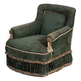 A Dark Green Upholstered Swivel Armchair Height 30 inches.
