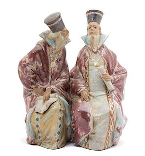 A Lladro Glazed Terracotta Figural Group of Two Scholars Height 11 1/2 inches.