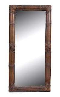 A Full Length Rattan Wrapped Bamboo Framed Mirror Height 83 x width 40 1/2 inches.