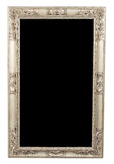 An Italian Carved Silver Gilt Framed Mirror 20TH CENTURY Height 58 3/4 x width 34 inches
