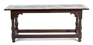A Contemporary Stained Pine Refectory Style Table Height 30 3/4 x width 72 x depth 42 inches.