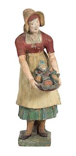 A Polychrome Terracotta Figure of a Woman Height 30 inches.