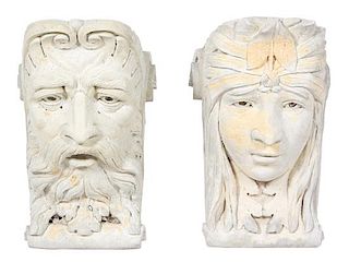Two Carved Stone Wall Masks Height 12 x width 7 1/2 x depth 7 1/2 inches.