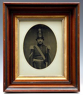 Mid-19th century painted whole plate tintype, soldier
