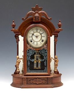 Waterbury walnut mantel clock with figures