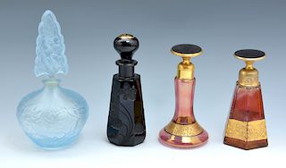 Grouping of four art glass perfume bottles